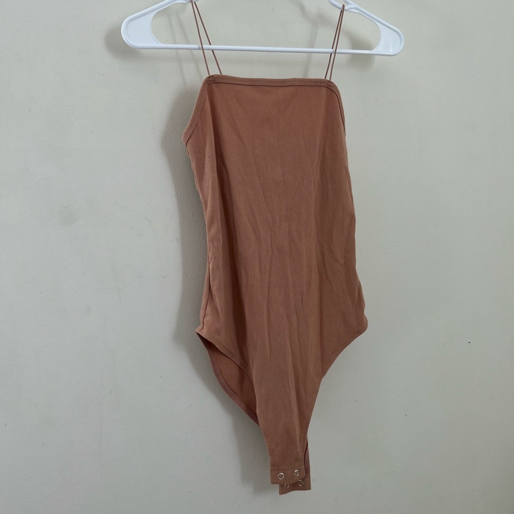 Like new peach tube top body suit, only worn once